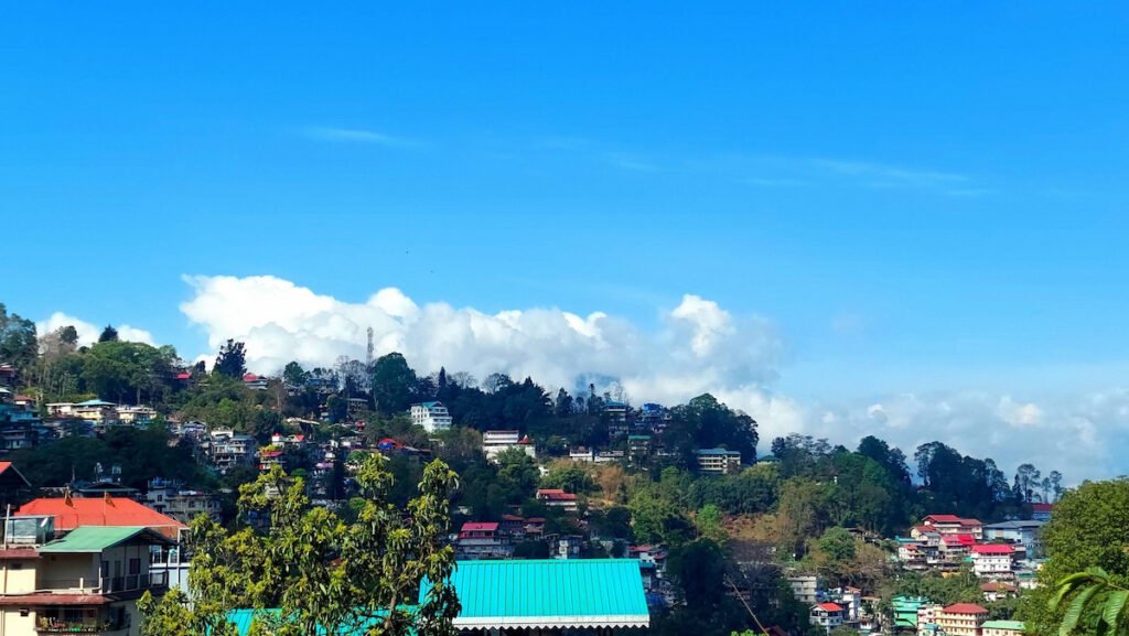 Scenic view of Kalimpong hills under a blue sky